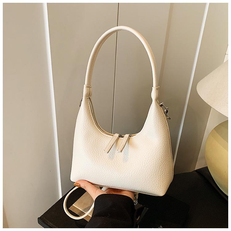 High-end niche bag women's new fashion simple messenger bag versatile shoulder armpit bag
