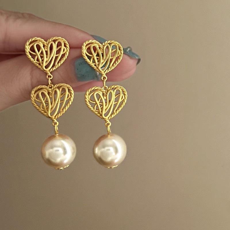 

Модные серьги-подвески для женщин золотой