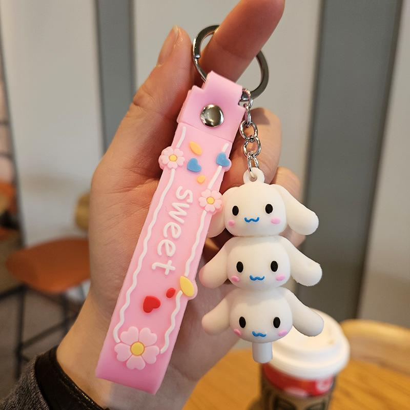 Yugui Dog Gestapelter Le Schlüsselanhänger Niedlicher Cartoon Melody Pudding Dog PVC Puppe Taschenanhänger