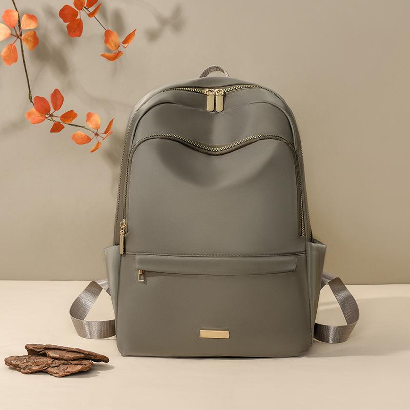 Schoolbag spring new fashion trend large capacity solid color backpack women commuting large capacity simple versatile back shoulder