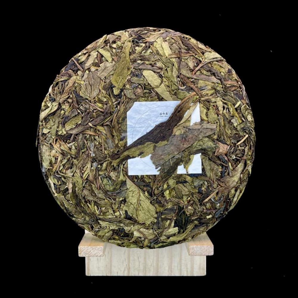 357g Yunnan Pu'er Teekuchen sieben Samen Kuchentee Island Blattgold reiner roher Tee