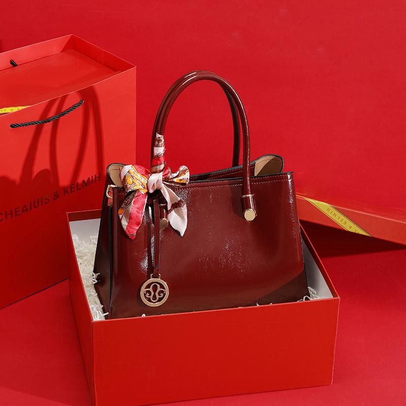 Elegant Red Mummy Bag: Fashionable, Spacious Handbag for Mother-of-the-Bride At Weddings