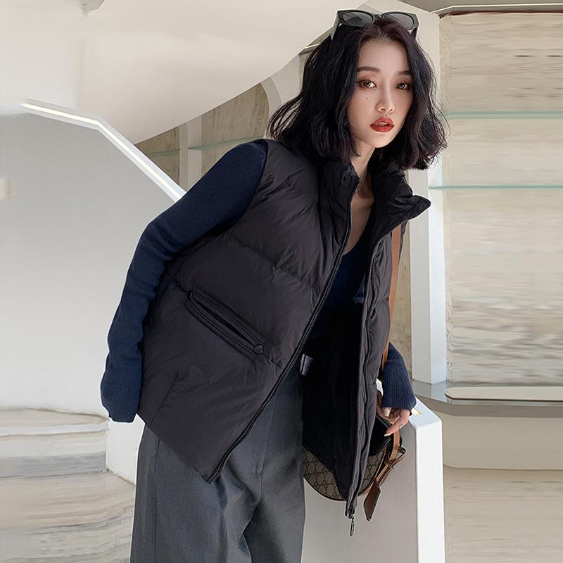 

Stand-up collar, down vest, women s outer wear, light and warm design sense of warmth, white duck down vest, large mouth vest, large size tide M чорний