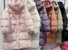 Anti-season autumn and winter new down jacket women's Chinese knot medium and long over the knee hooded waist thickened design sense niche