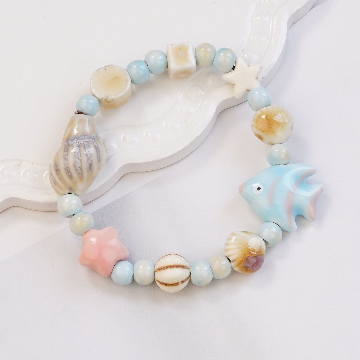 Jingdezhen manufacturer supply ceramic bracelet marine fish bone porcelain beads with bracelet wholesale jewelry national style