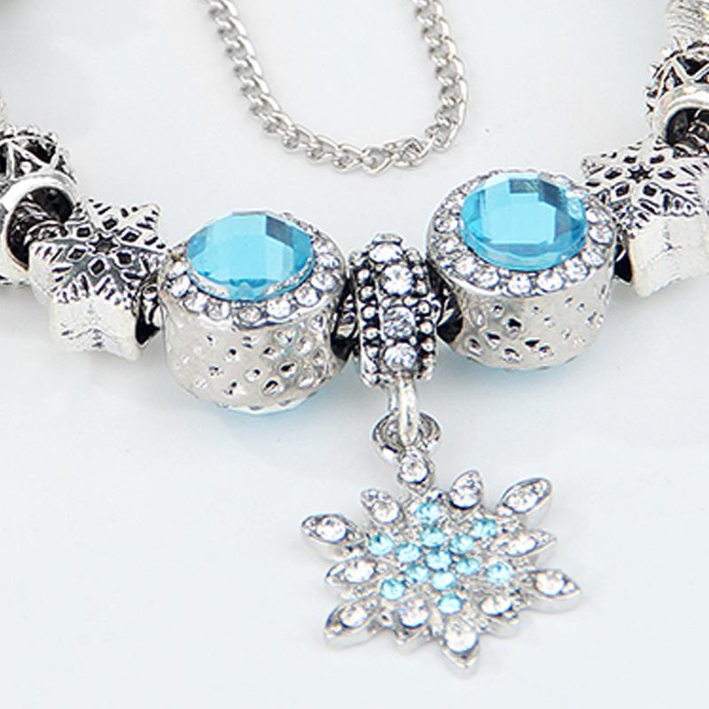 Snowflake & Santa Claus Charm Bracelet with Large Beads for Christmas.