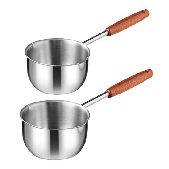 Oljetråg i rostfritt stål Dubbla hällpipar Handtag som inte blir varma Jämn värmefördelning Induktionshäll