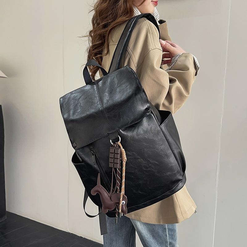 Retro Hong Kong style PU soft leather texture backpack men's large-capacity American schoolbag female college student computer backpack waterproof
