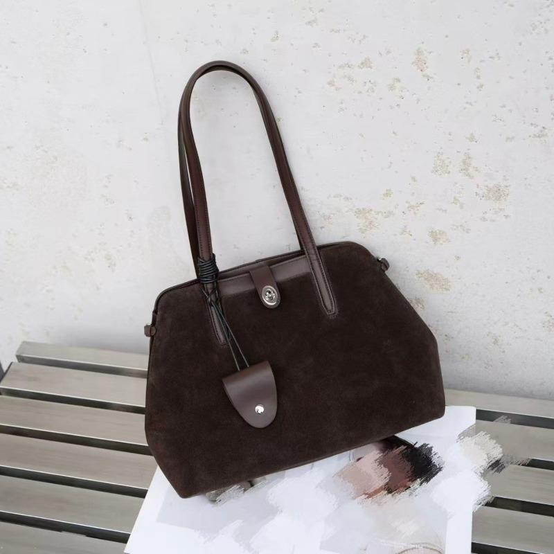 Leder-Umhängetasche große Kapazität vielseitig Herbst und Winter neu Achseltasche leichter Luxus Anhänger schlicht Nische Damen-Tasche