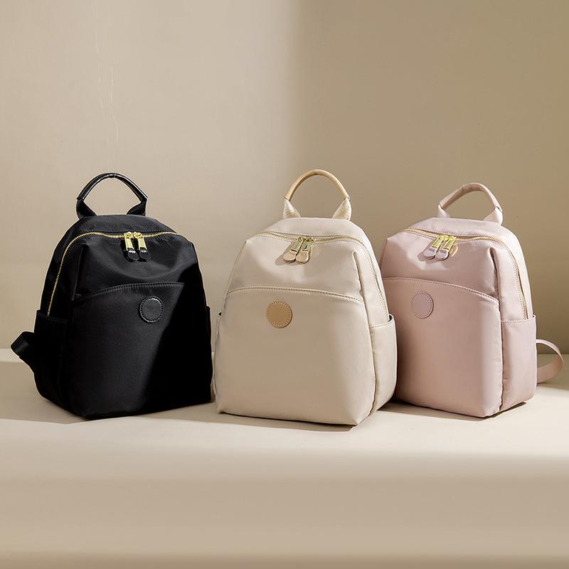 Leichter Nylonstoff Kleiner Rucksack für Damen Neue Mode Wasserdichte Oxford-Stoff Reisetasche Pendeln Einfacher Rucksack