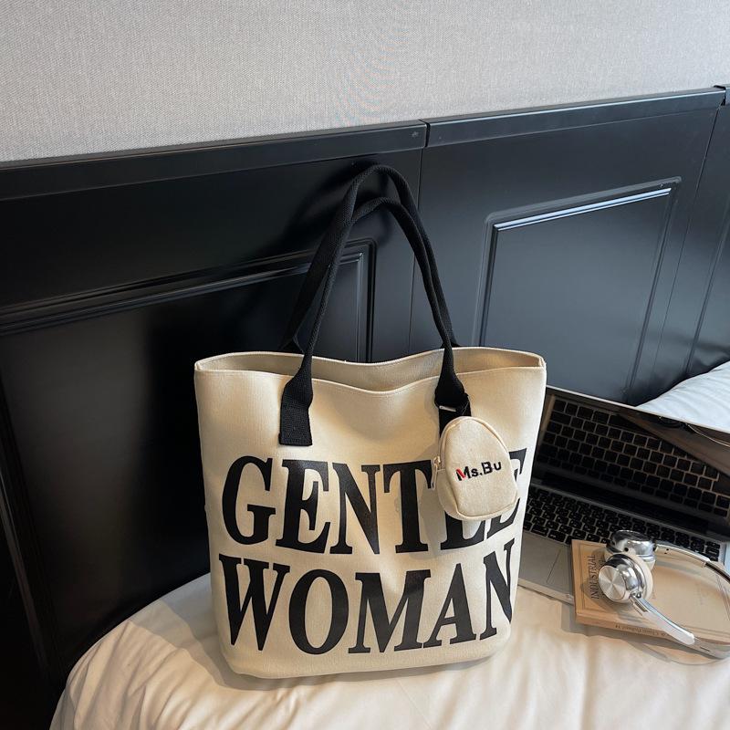 2025 autumn new fashion simple commuter large capacity shoulder bag Korean version casual canvas bag alphabet tote bag