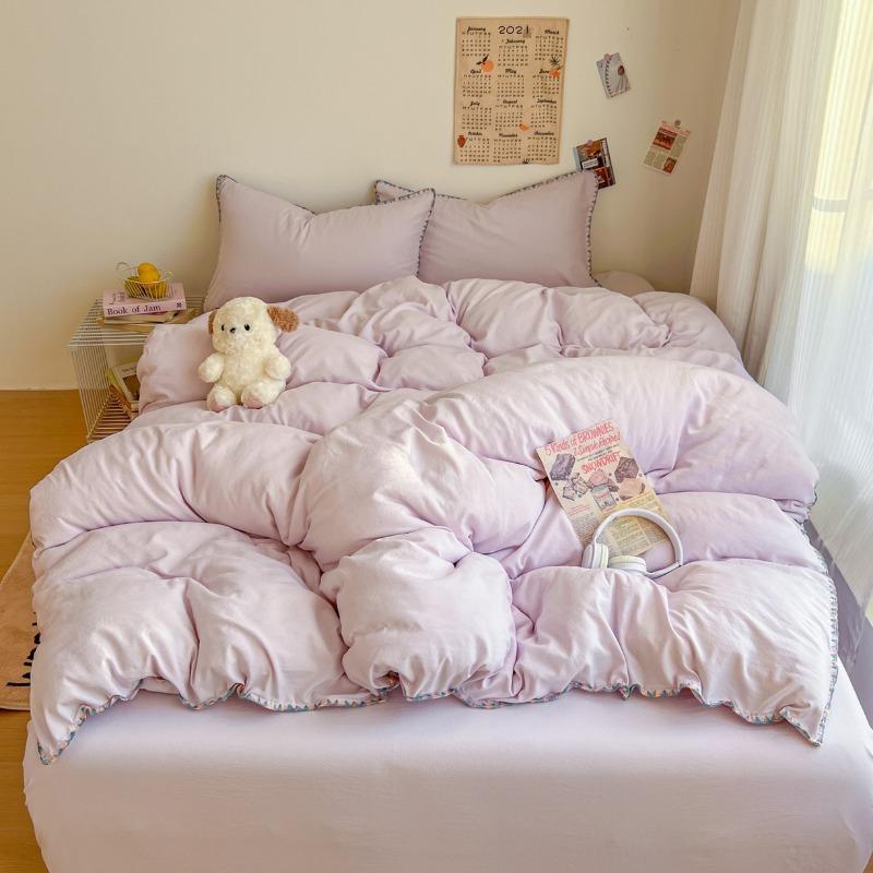 Literie Class A 2025 nouveau vent crème couleur unie drap de lit ensemble quatre pièces housse de couette étudiante ensemble quatre pièces ménage
