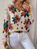 Women's Off-White V-Neck Knit Sweater with Blue Floral Pattern and Lace-Up Sleeve Detail