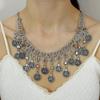 Boho Ethnic Statement Necklace With Hollow Carved Coin Pendant Tassel Detail Zinc Alloy Tone Layered Water Wave Chain