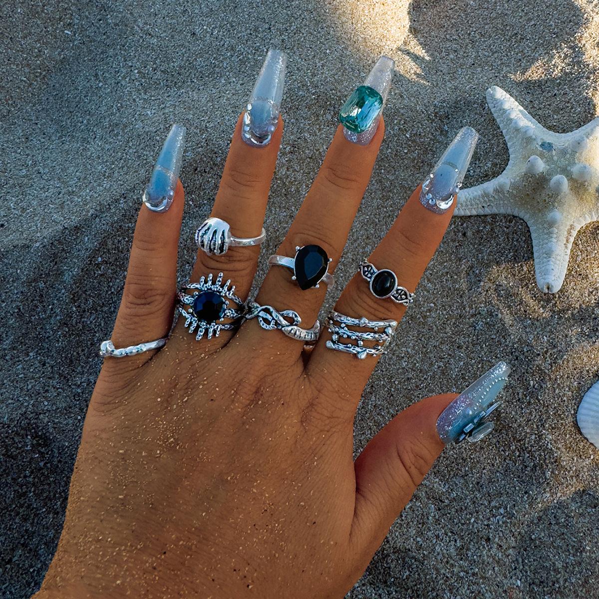 

European and American new dark eye diamond ring set Punk personality geometric hand claw seven-piece set