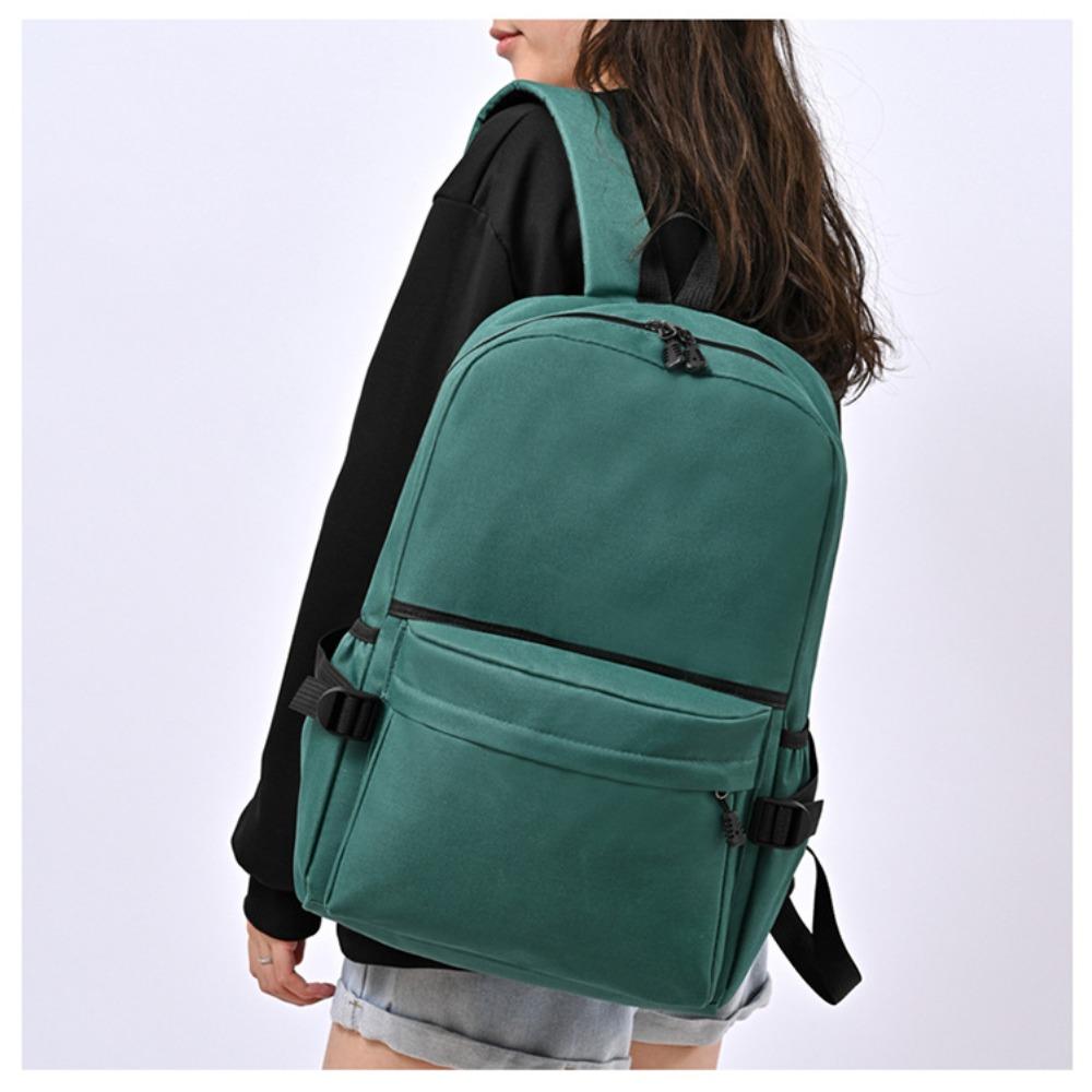 Travel agency backpack solid color fabric backpack primary and secondary school student schoolbag travel bag