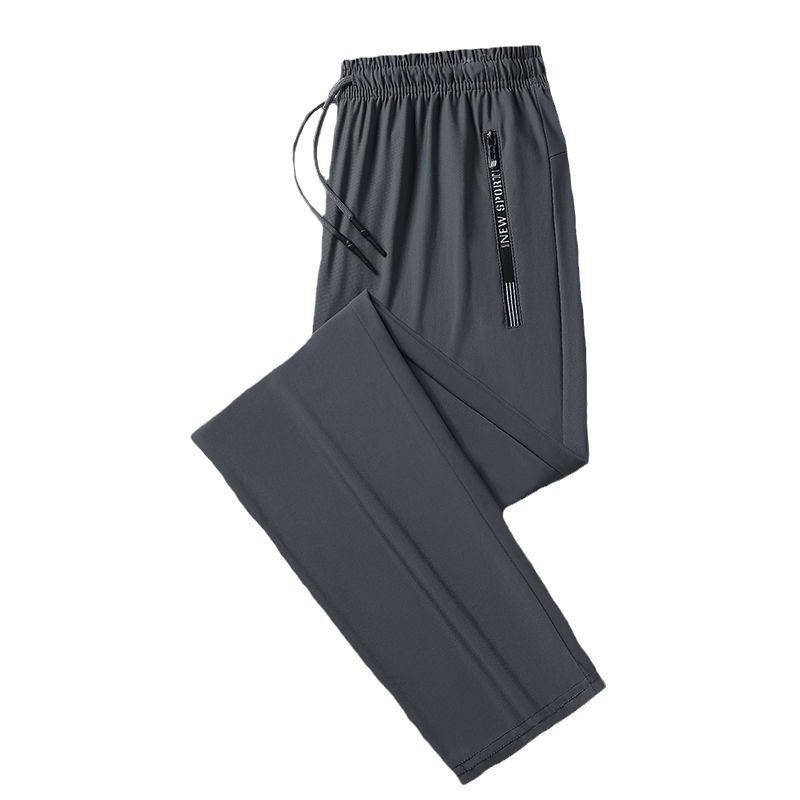 Pantaloni della tuta casual estivi da uomo in seta ghiacciata, sottili e traspiranti, con gamba dritta, tasche con cerniera e polsini.
