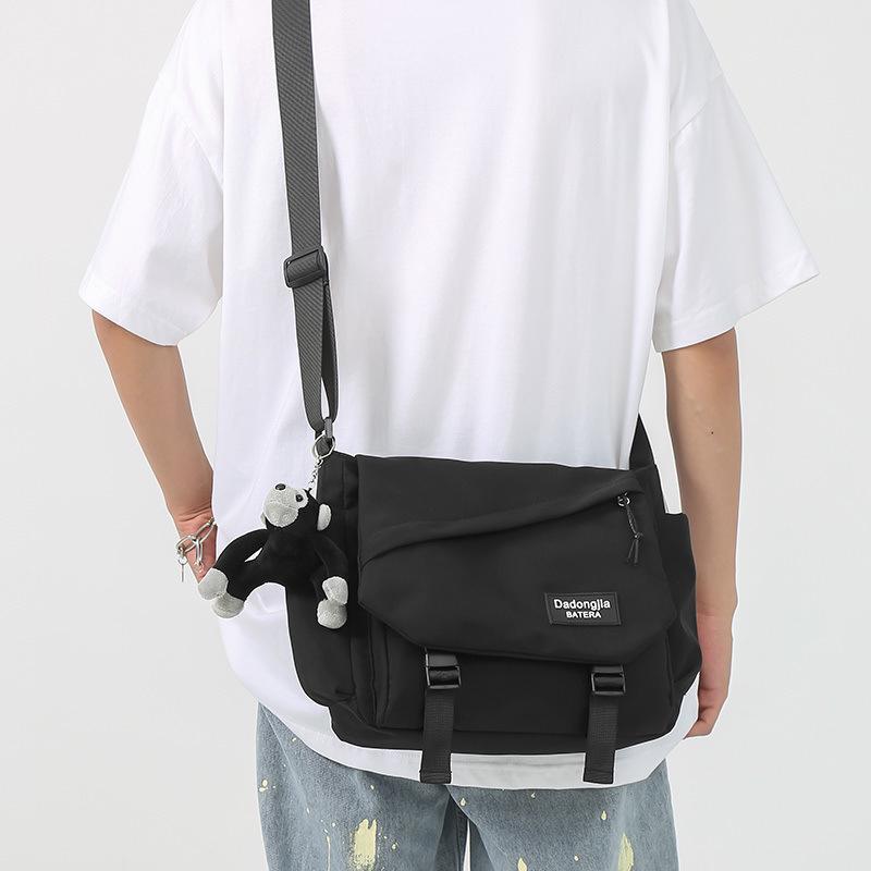 

Unisex Casual Versatile Shoulder Bag: Large Capacity Student & Commute Messenger Backpack Bag Only