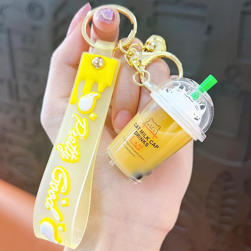 Exquisite Quicksand Panda Keychain: Cartoon Oil-Filled Doll Bag Pendant and Car Accessory