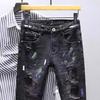 European and American trendy brand ripped jeans men, splashing ink paint point elastic slim-fitting small-footed denim trousers
