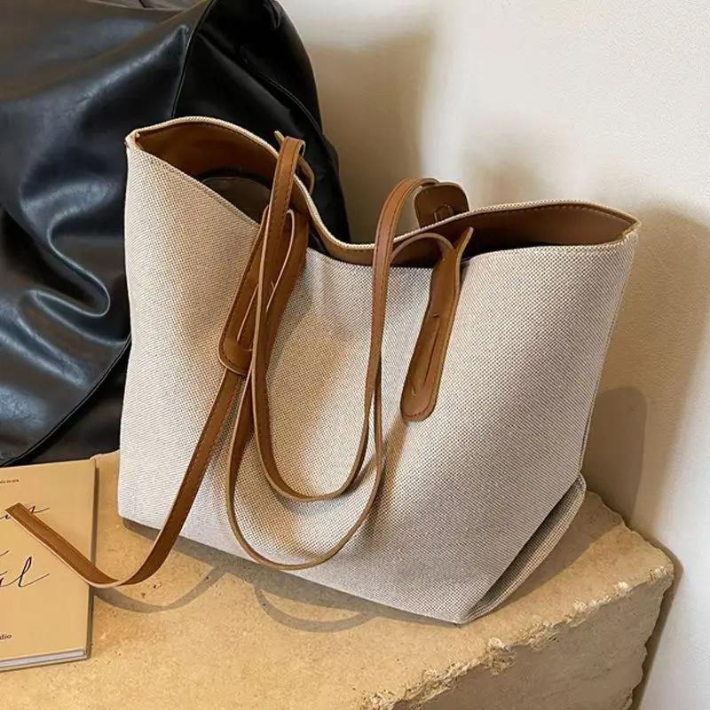 

Корейская версия Большая вместимость Сумка под мышкой Женщины Новая сумка-тоут для поездок на работу Универсальная сумка через плечо Портативные холщовые сумки large siez коричневый