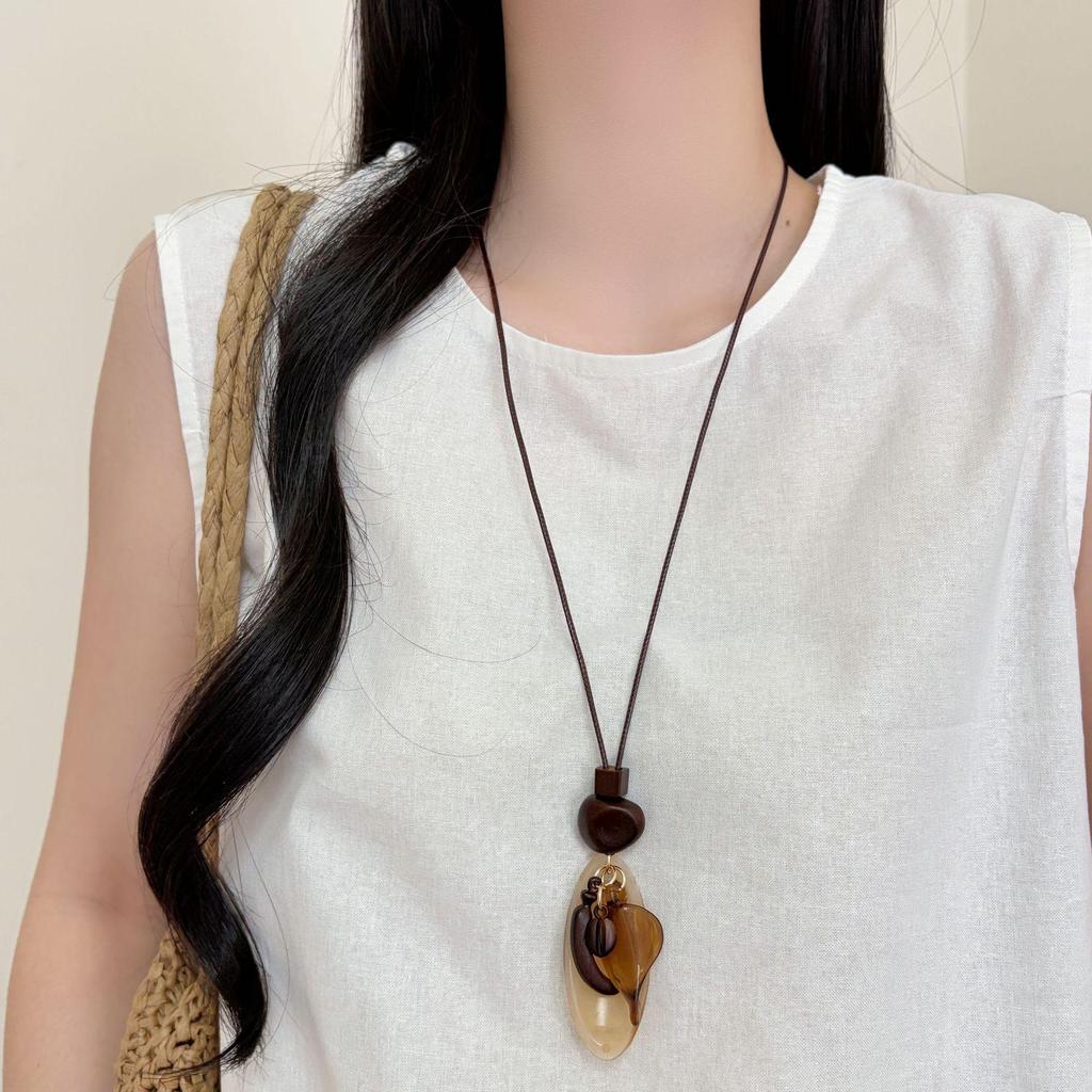 Chinese Floral Tassel Pendant Necklace - Ethnic Niche Design for Women, Versatile Long Sweater Chain Fashion Accessory