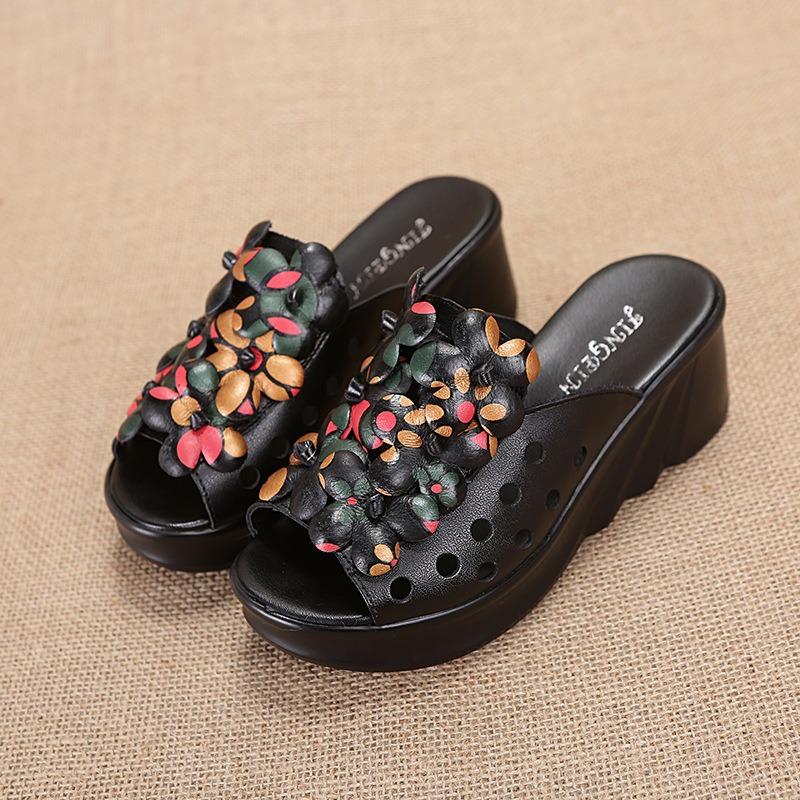 Cowhide slippers women's summer wear thick bottom wedge heel one-word drag fashion flower comfortable temperament high heel sandals
