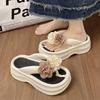 Height-increasing thick-soled flip-flops shoes for women's summer wear new high-end flower beach non-slip cool slippers
