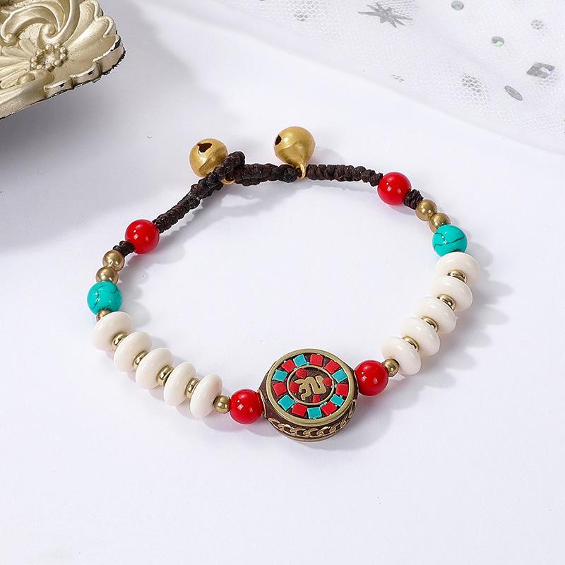 Ethnic style hand-woven retro color beaded bracelet Tibetan pure copper bracelet bell antique hand rope women s jewelry