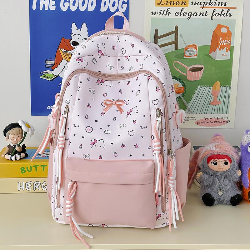 Cute and versatile new Korean version large-capacity high-value bow cartoon backpack sweet middle school backpack