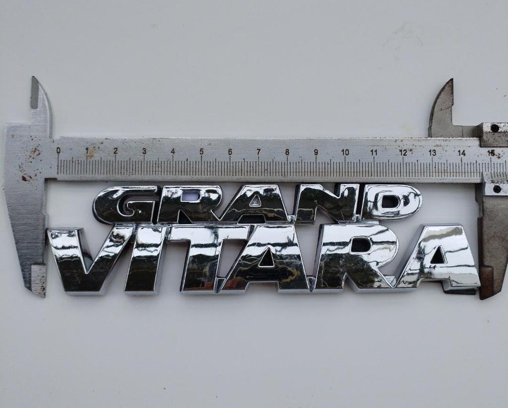 Suzuki S Logo Badge - Original Hollow Front Grille Emblem