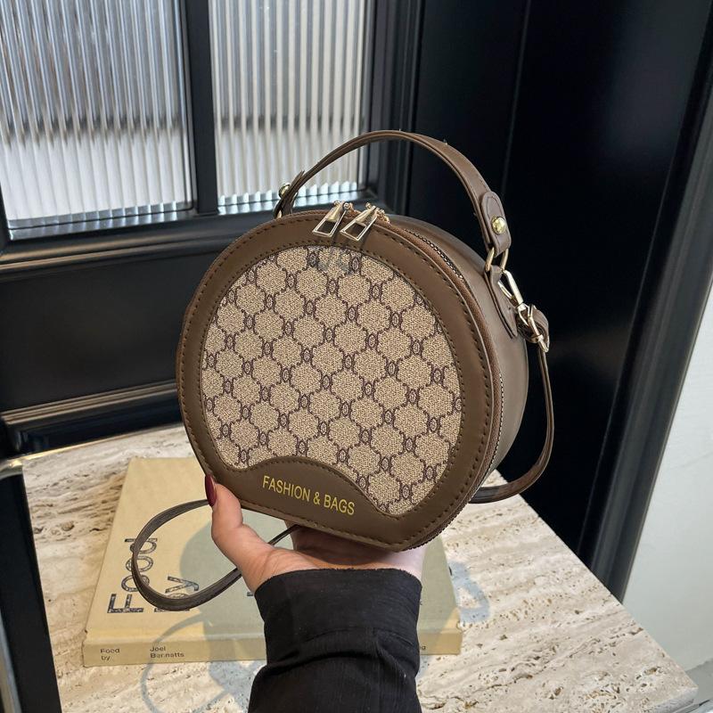 

Small bag 2025 new texture women s fashion explosion fashion portable niche foreign style messenger bag retro small round bag