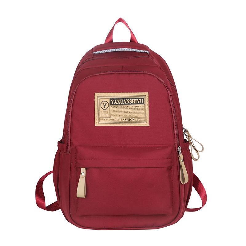 

Fashion trendy cool large-capacity labeling contrasting color men s and women s backpacks 23 autumn and winter new travel backpacks красный