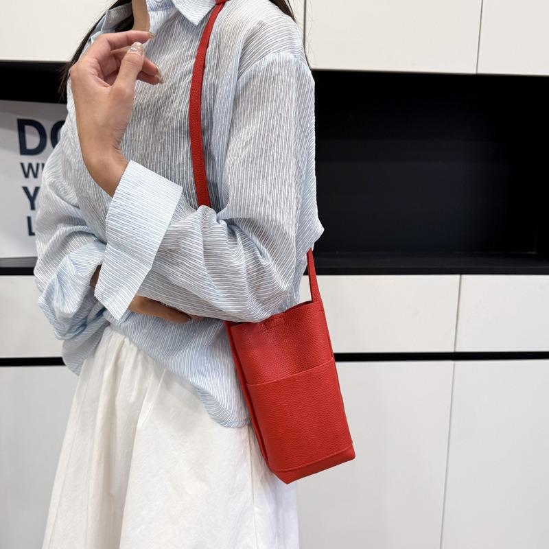 Solid color vertical mobile phone bag fashionable and simple versatile shoulder messenger bag advanced texture temperament casual women's bag