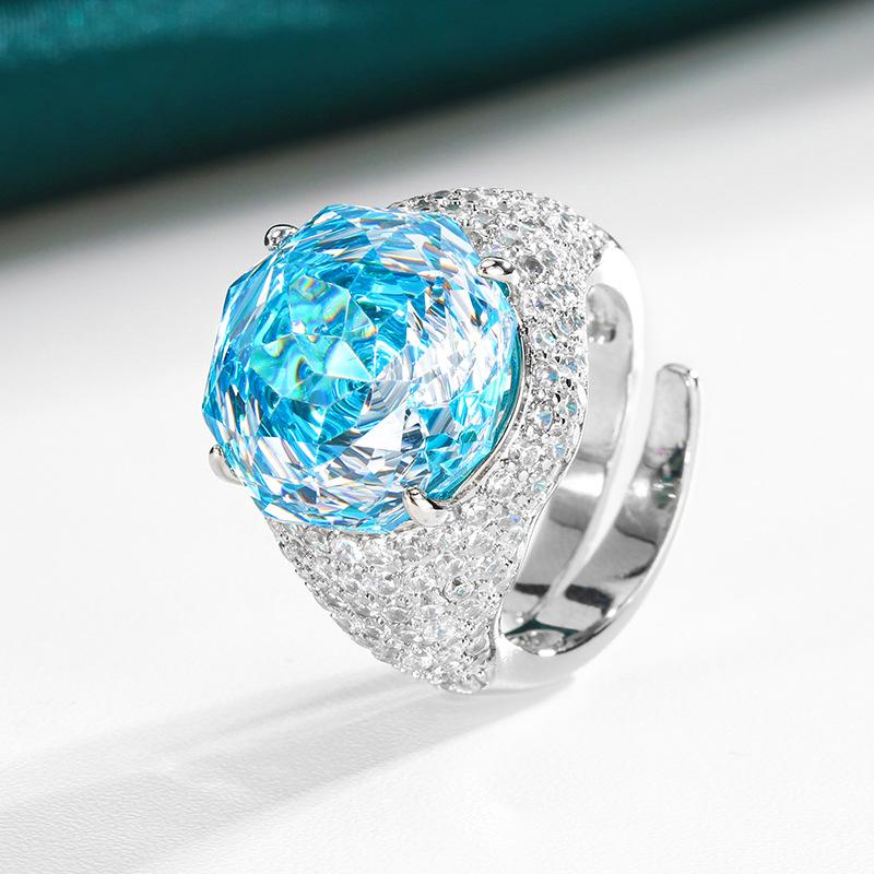 

Ювелирные изделия Медное основание Позолоченное Имитация Огранки Роза Цвет Сокровище Темперамент Ретро Кольцо Главный камень 14 мм