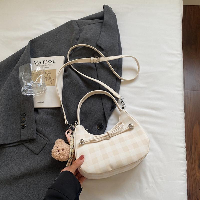 Korean version of plaid portable dumpling bag women's 2025 summer new temperament niche high value daily commuter messenger bag