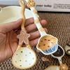 Cartoon ceramic long-handle spoon, food-safe & dishwasher safe, ideal for soup, dessert and daily home use.