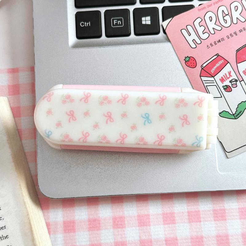 

Pink Bow Heart Foldable Comb Mirror, portable anti-static massage design, compact for travel and daily makeup. Bow