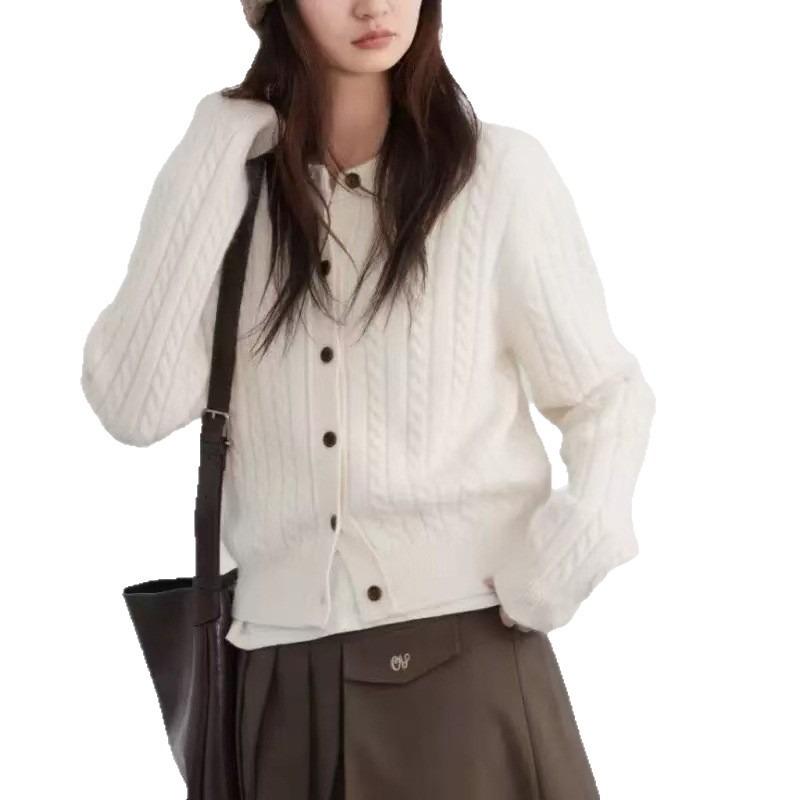 New twist woven single-breasted round neck simple temperament long-sleeved knitted cardigan women's knitted jacket