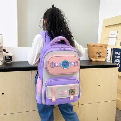 School BagsNew Primary School Bag To Reduce the Burden of Spine Protection Large Capacity Backpack Leisure 1-3-6 Grade Boys and Girls