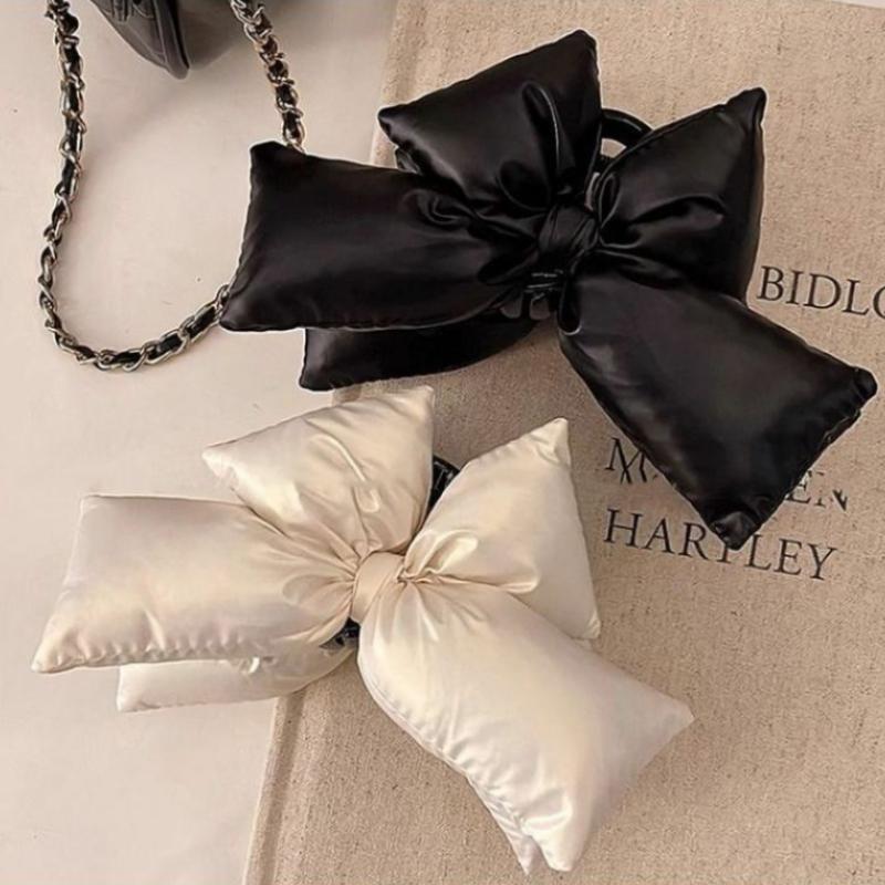 A Girl with a Large Black Bow Clip, a Thick Hair Clip with a Big Chin, and a Fashionable Anti-slip Winter Hair Accessory