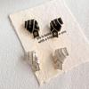 Black & Gold Enamel Twist Earrings: Versatile Luxury Studs for Autumn/Winter 2025