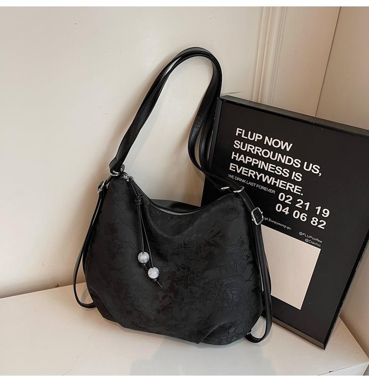 Large-capacity bag women's 2025 spring new niche simple casual versatile shoulder messenger bag fashionable tote bag