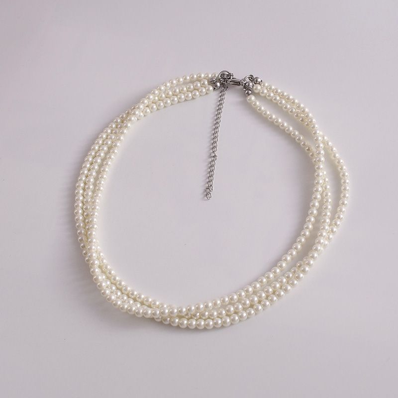 Fashion jewelry, bohemian multi-layer necklace, popular street auction popular pearl necklace.