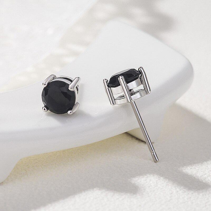 

Серьги - гвоздики с камнем