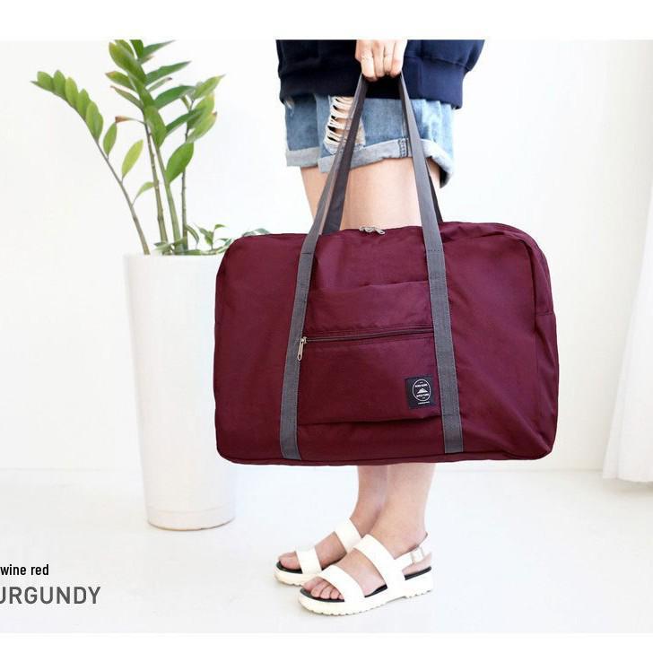 High-Capacity Foldable Travel Bag with Wheels and Logo