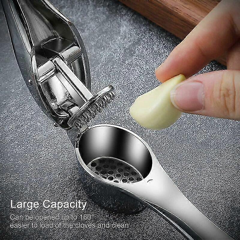 Garlic press, stainless steel garlic press, professional garlic press, dishwasher safe, garlic press with non-slip handle