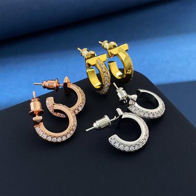 Pendientes Nobles de Lujo Ligero Frío Pendientes de Tuerca de Diamante Unilateral con Viento Ins Letra T Pendientes de Círculo con Estrella