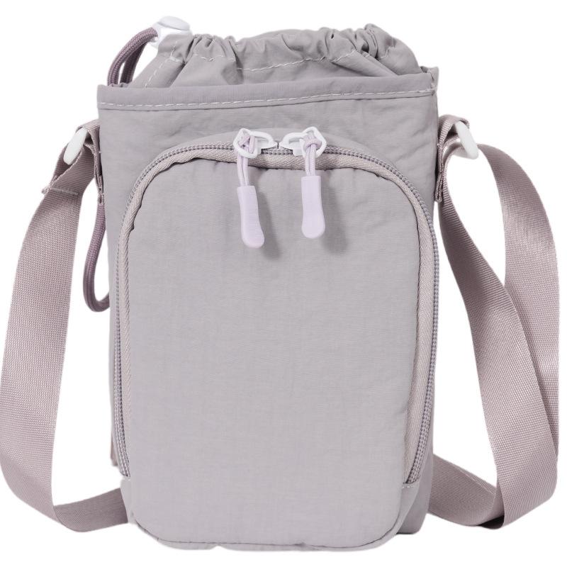 

Spring and summer new products are fashionable, lightweight, sports style, simple kettle bags, men s and women s same travel versatile commuter messen