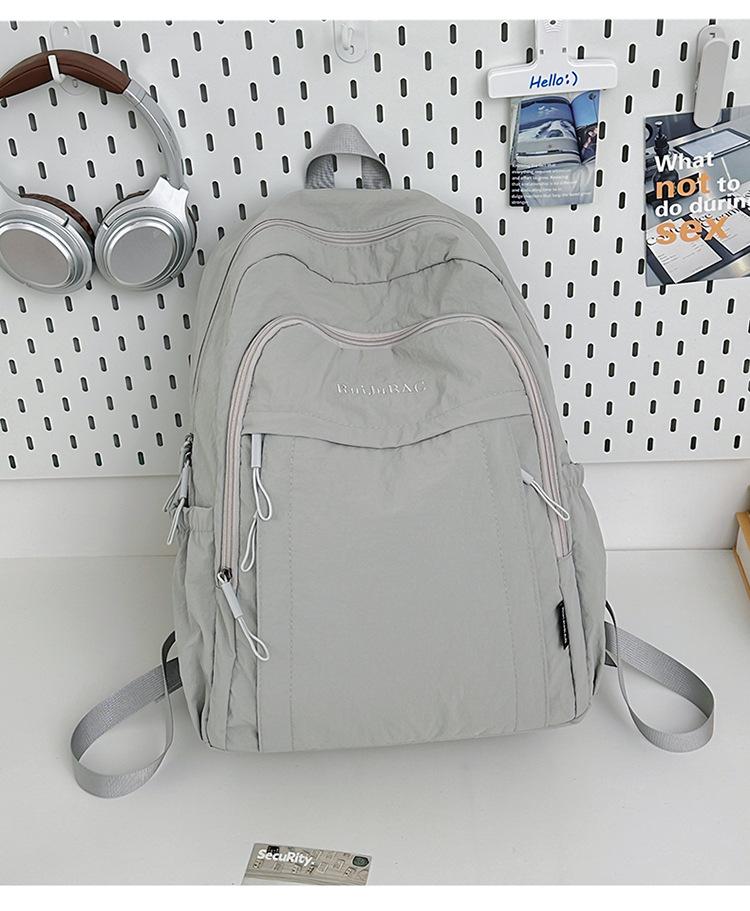 Rucksack mit großem Fassungsvermögen und einfarbig für Studentinnen, leichte Laptop- und Campustasche im japanischen und koreanischen Stil
